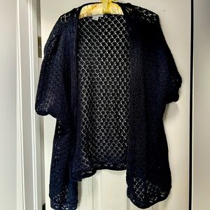 Black, crocheted sweater.